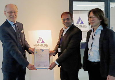 Gold winners Ankur Baliyan (middle) and Hideto Imai (right) receive the Paper Award certificate from WITec K.K. representative director Michael Verst (left) at the Nissan Analysis and Research Center.